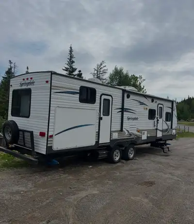 30 ft spring dale camper with outdoor kitchen 2 slides with rear bunk house