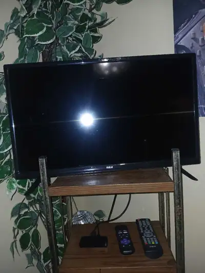 24" TV , with Rocu Box, View more