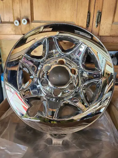 Brand new set of 4 wheel skins for GMC OR CHEVY rims. They are for 17" rims. Turn your steel rims in...