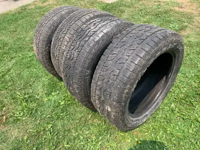 Selling set of used Falken Wildpeak A/T Raised white letter tires 275 55 R20. Two tires have approxi...