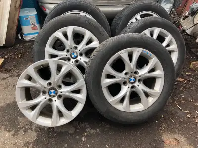 6 x BMW 17” Rims with 5 tires. Set of 4 BMW X3 rims with 3 Continental Pure Contact 235/55/17 tires,...