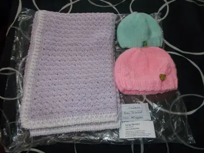 baby blanket with 2 hats hand made size on photo asking $15.00 new