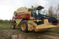 2 -New Holland TR85 Combines with Heads