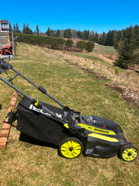 For Sale:  Ryobi push self-propelled lawnmower with catcher bag.