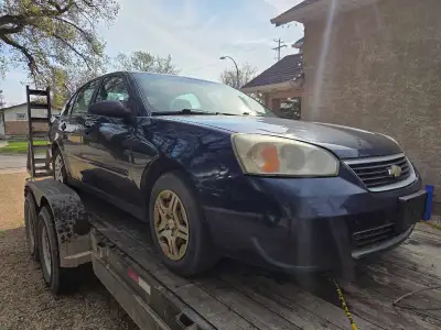 Part out or sell whole 2005 Chevy Malibu 4 cylinder auto. Runs but burns coolant. Body is in pretty...