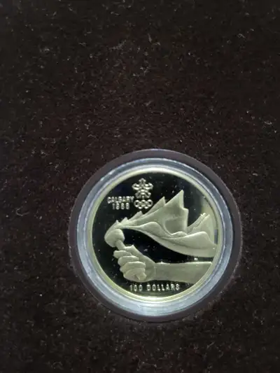1987 Canadian $100 Calgary Olympics commemorative gold coin (14-karat proof) in mint condition with...