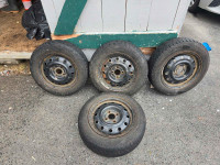 4 Steel rims, 4 good tires (2 winter, 2 all season) 