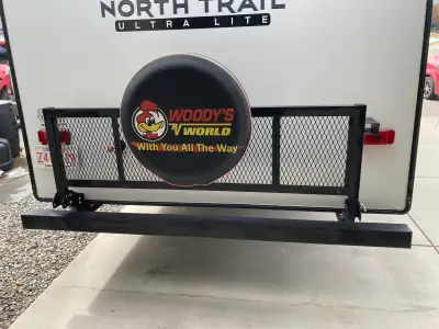 This used RV cargo carrier is perfect for adding extra storage to your camping setup. It has a sturd...