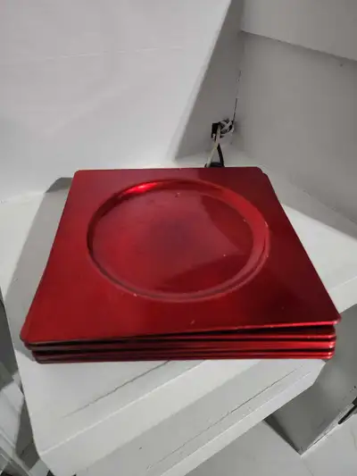 Add a touch of elegance to your table setting with these vibrant red square charger plates. This set...