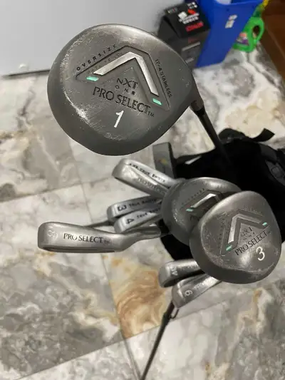 Selling golf clubs with bag, View more