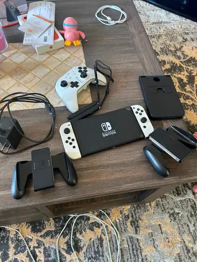 Nintendo switch oled with 128gb memory card adult owned, View more