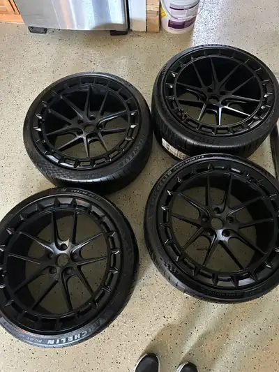 This ad is for 4 x Tesla S performance rims and tires ($14000 retail). Rear tires are brand new ($20...