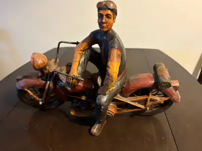 Unique Harley Davidson motorcycle model with rider. Very heavy composite. Would make an excellent Ch...