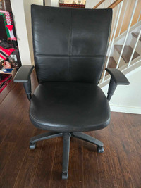 Black leather adjustable office chair.  In excellent condition. 