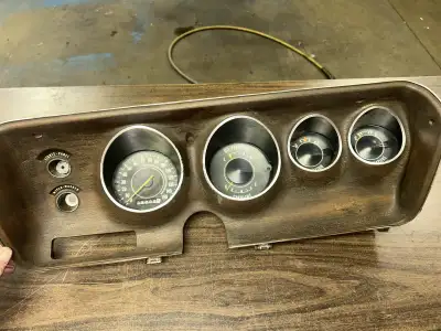 Radio delete Rallye cluster from a 1971 dodge Charger. Has a small crack at the hole for heater cont...