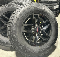 G117. 1995-2024 GMC\Chevy 1500 rims and Toyo AT3 tires