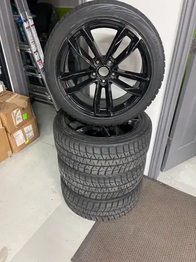 245/40/18 Bridgestone Blizzak winter tires on Black Alloy Rims. Excellent condition. Were originally...