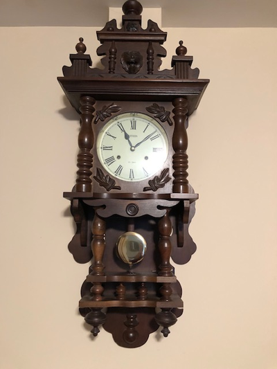 Beautiful wooden wall clock Original Key and Instruction booklets. Length from top to bottom is 3 fe...