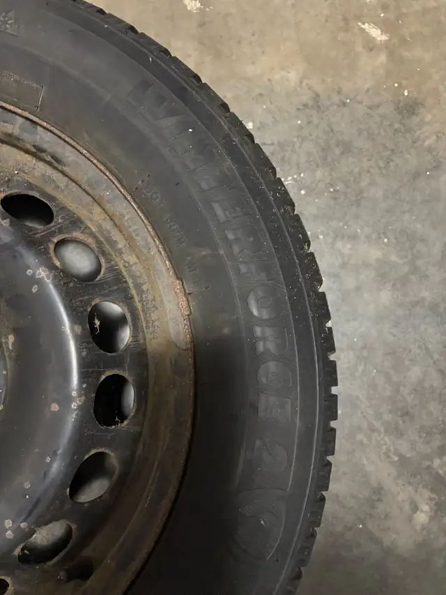 winter tires and rims of a 2018 VW Passat 215/60R/15 in Tires & Rims in Bedford - Image 5