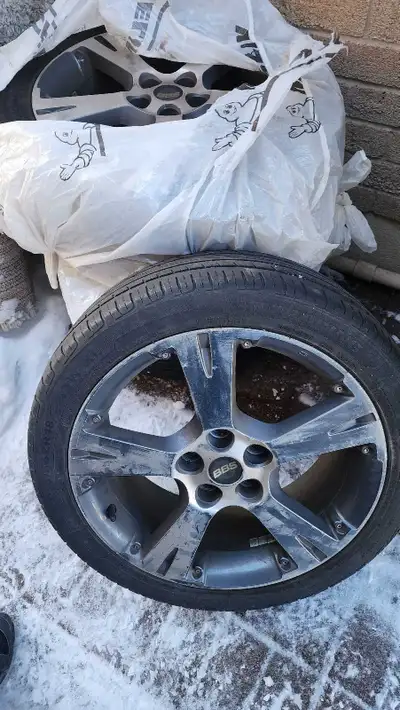For sale is a set of used Toyota rims with a 5-bolt pattern and a tire size of 215/45ZR18, suitable...