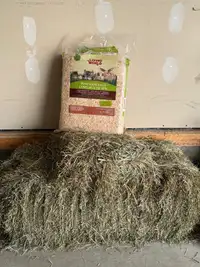 Hay bale and small animal shaving bag