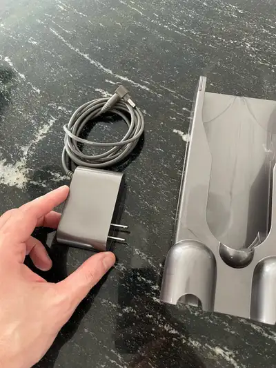 Hi, I have an original charging station / power adapter for the Dyson V15 (which I'm sure fits other...