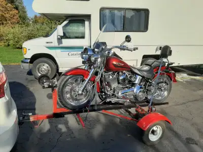 Gorgeous bike mint condition new tires new brake and new starter lots of chrome with trailer