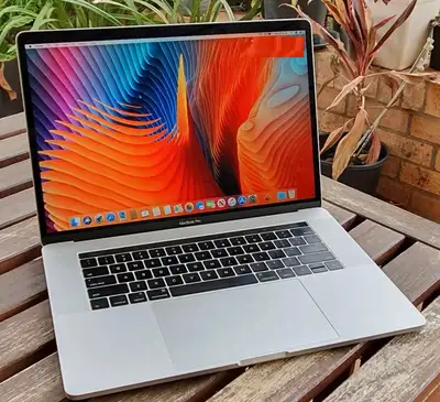 MacBook pro 15 Retina Touch Bar/ ID 2017 in excellent condition. Come with power adapter. -Intel Cor...