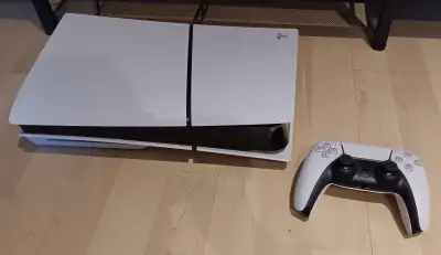 Playstation 5 slim with disc, remote and games, View more
