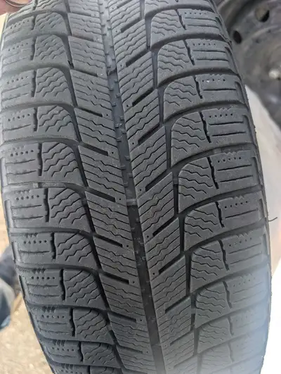 Snow Tires for sale. Michelin 205/60R/16 On OEM RIMS for Mazda 300$. Great condition.