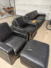Black leather natuzzi couch chairs and ottoman