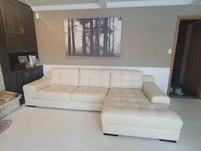 Couch with right side chaise along with a chair.