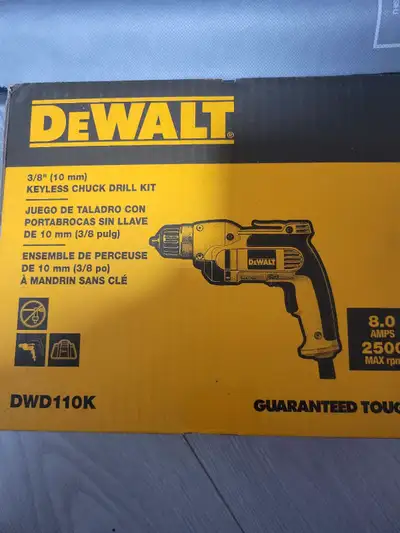 This is a new DeWalt 3/8-inch (10mm) keyless chuck drill kit, model DWD110K, featuring an 8.0 amp mo...