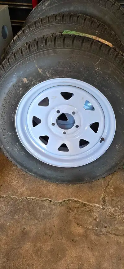 Qty 3 tires and rims. Brand new In Niagara falls 289-257-7005 Size St205/75D15 Trailer tires qty 3 P...