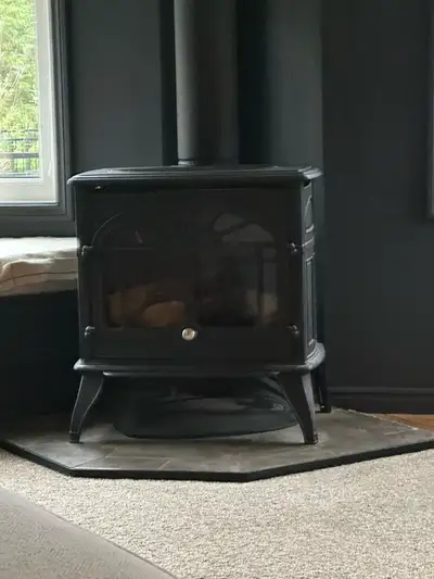 First gas FP, $1800, Napoleon 2-way Gas FP, $800, New Boston - Vintage Wood Stove $600