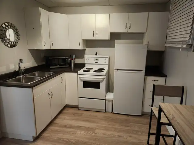 FURNISHED ONE BEDROOM BASEMENT SUITE UTILITIES INCLUDED