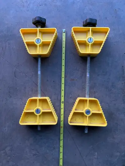 Set of 2 small wheel chocks to go between RV travel trailer wheels to reduce movement. Like new cond...