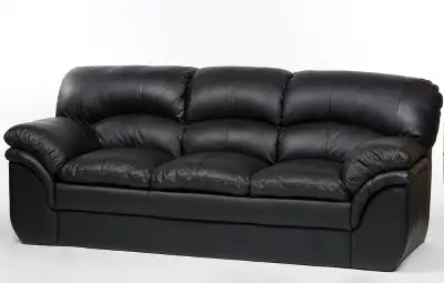 This set includes a three seat couch and an armchair in black leather. It is clean, very comfortable...
