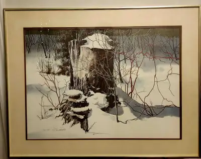 Framed, matted print of a winter scene "Snow Caps" by Jack Reid. Signed and numbered
