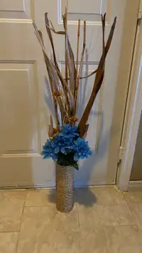 Artificial bamboo and floral arrangement 