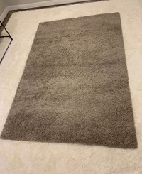 Short pile beige area rug - great condition! 
