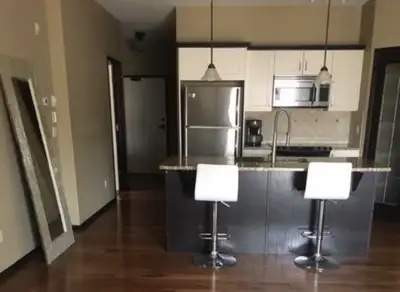 Top floor! 2 bed, 2 bath, heated underground parking, heated floors, gas BBQ, in-unit laundry, priva...