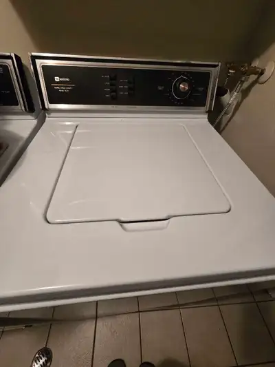 Can be repaired or used for parts. Washer isn't emptying the water. Was told it's the 'water outlet...