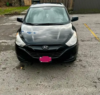 Hyundai Tucson 2013 4DR FWD 142503 kilometres Automatic The front passenger window button sticks and...