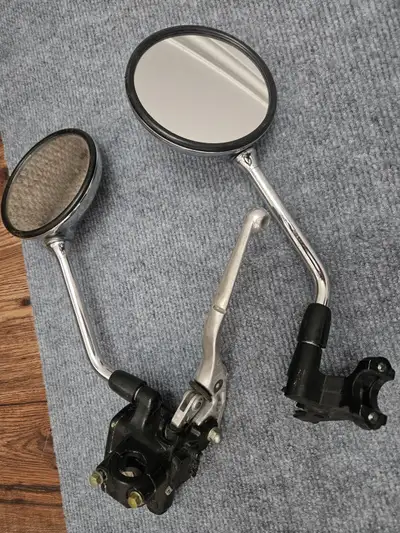 Various Honda motorcycle parts available for sale - includes: - Chrome mirrors and brake master $40...