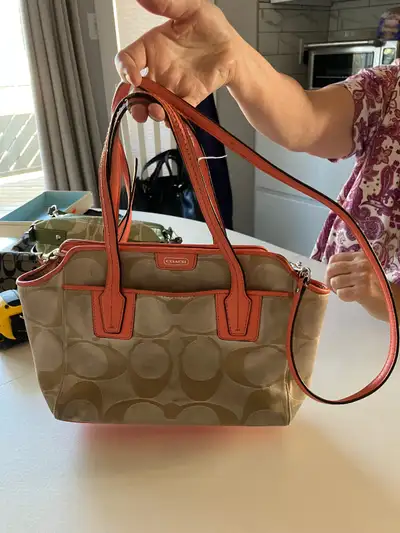 Imitation Coach mini tote crossbody bag. Beige and coral in color. Detachable shoulder strap. Dual s...