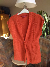 2 Women's sweaters. The red one is Medium 8-10