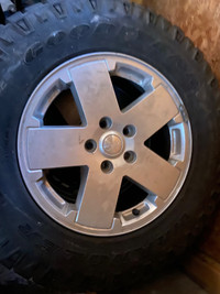 Set of 4 Goodyear tires (275/65R18) on Jeep rims 