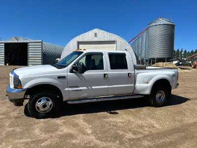 2002 F350 Crewcab Shortbox Dually 4x4 Lariat Trim full leather Bullydog tuner and factory rpm ford b...
