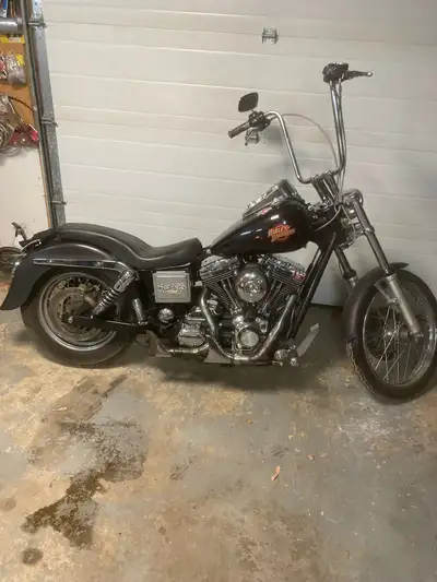 Harley wide glide I’m the second owner and have done all the work to it. Custom frame three inch low...